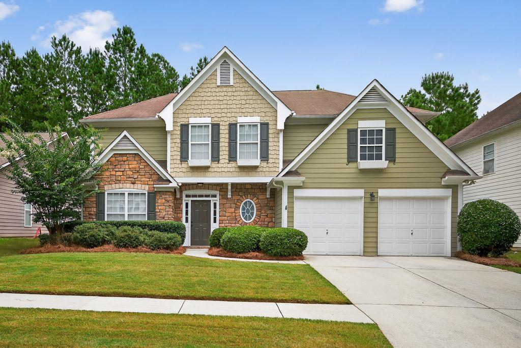 Welcome to 3010 Cooper Woods Drive in Loganville, a beautifully maintained 4-bedroom, 2.5-bath home offering approximately 2,820 sq ft of comfortable living space. Built in 2003, this home features fresh interior paint and new luxury vinyl plank flooring in the foyer, kitchen, and laundry room. The spacious primary suite includes a private sitting room perfect as a quiet retreat, library, or nursery for keeping little ones close. The inviting floor plan offers formal living and dining areas, a family room with a stone fireplace, and an eat-in kitchen. Located in a quiet, sidewalk-lined neighborhood, residents enjoy community amenities including tennis courts, an outdoor pool, and a playground—ideal for meeting neighbors or enjoying quality time with family without leaving the neighborhood. Conveniently situated near shopping, dining, and local parks such as Bay Creek Park and Tribble Mill for added outside activities. This home is also served by top-rated schools: Trip Elementary, Bay Creek Middle, and Grayson High. With its blend of style, comfort, and community, 3010 Cooper Woods Drive offers a wonderful place to call home.