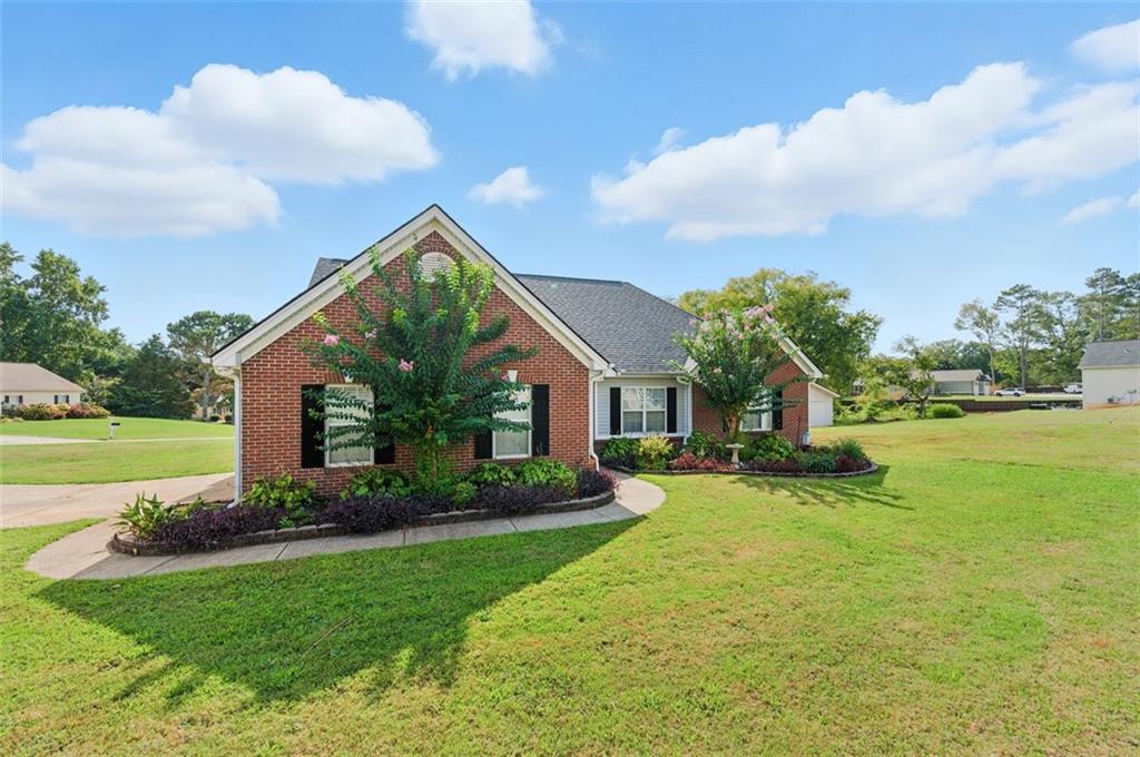No HOA. Beautiful 3 bedroom/ 2-bathroom, 2 car garage home on almost a full acre with bonus room and detached high ceiling garage/workshop. Kitchen remodeled in 2015. All appliances as well as washer dryer come with home. Ceiling fans in bedrooms and 2 on back patio. All light switches are smart switches. Master opens out onto back patio. Master bathroom has his and her sinks, large tub, and separate shower. Detached garage/workshop has full electricity and ceiling vent fan. Home bonus room could be used for office and extra-large attic space could be converted. Home has covered patio for grill or smoker, and potential pool. Room for garden also. New HVAC!! Roff replaced 2017, and hot water heater replaced 2019. Will sell fast, come see, and send offers asap!