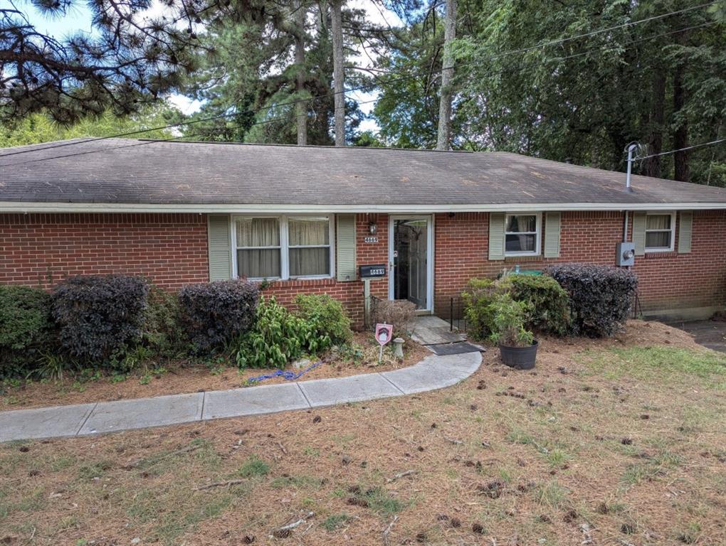 This ranch home is ready for your vision or new development and has great potential in the growing and desirable City of Tucker. Large corner lot with driveway on the neighborhood street rather than Lawrenceville Hwy. Multiple choices through neighborhood for accessing the main rd. The options here to renovate the existing home, new construction or potential commercial or all on the table for you. Don't miss this opportunity! The current floor plan inside is open to design or current configuration with living room, dining, separate den with freestanding gas flue f/p, large kitchen with attached laundry room, 3 bedrooms and 1 bathroom. The laundry rear door exits to a covered screened porch on deck and spacious back yard. This area could easily be converted into a 2nd bathroom through den. Drop down walk-in crawl space. Property being sold "As Is".