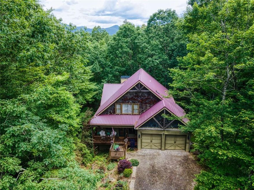 Rustic Elegance & Mountain Living in Gated Cleveland Community.  Tucked at the end of a private road in one of Cleveland's most sought-after gated communities, this stunning 2-bedroom, 2.5-bath home offers the perfect blend of rustic charm and modern comfort. With a metal roof just 3 years old, this home is built to last and thoughtfully designed for both relaxation and entertaining.  Step inside to a warm and inviting open-concept layout featuring hickory floors throughout, tongue-and-groove cathedral ceilings and walls, floor to ceiling rock fireplace,  custom hickory cabinets with built-in pull-out shelving, granite countertops, and a stylish farmhouse sink. Recessed lighting adds a polished touch throughout the living space. The master suite includes private access to a screened-in porch—your own tranquil retreat.  The unfinished basement is already studded and plumbed for an additional bathroom, offering a blank canvas for future living space, workshop, or guest suite.  This exclusive, amenity-rich community offers a gated entrance, pool, clubhouse with game room, pickleball courts, walking trails, and even stables with pasture for horses—making it a true North Georgia lifestyle destination. Best of all? Furniture stays—just bring your suitcase and start enjoying mountain life.  
Don't miss this move-in ready gem with charm, space, and potential!