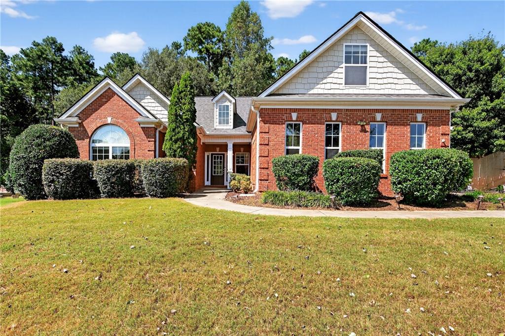 Welcome to 2658 Ivey Lace Ct, Bethlehem, GA. This brick-front, 1-story ranch offers 4 bedrooms and 3 full baths, plus a versatile bonus room that could easily function as a 5th bedroom, office, or flex space. Inside, you'll find an open floor plan with a bright and inviting living area, a kitchen with granite countertops and ample cabinetry, and a large master suite with tray ceilings and abundant natural light, creating a comfortable retreat. The exterior is equally impressive with a large fenced backyard, complete with a gazebo, deck, and patio-perfect for outdoor living and entertaining. While the home could use a little TLC, the updates needed are not major, offering excellent potential for investors, first-time buyers, or those looking to downsize without sacrificing space. Conveniently located in Gwinnett County, this property provides the charm of Bethlehem living with convenient access to shopping, dining, and major roadways.