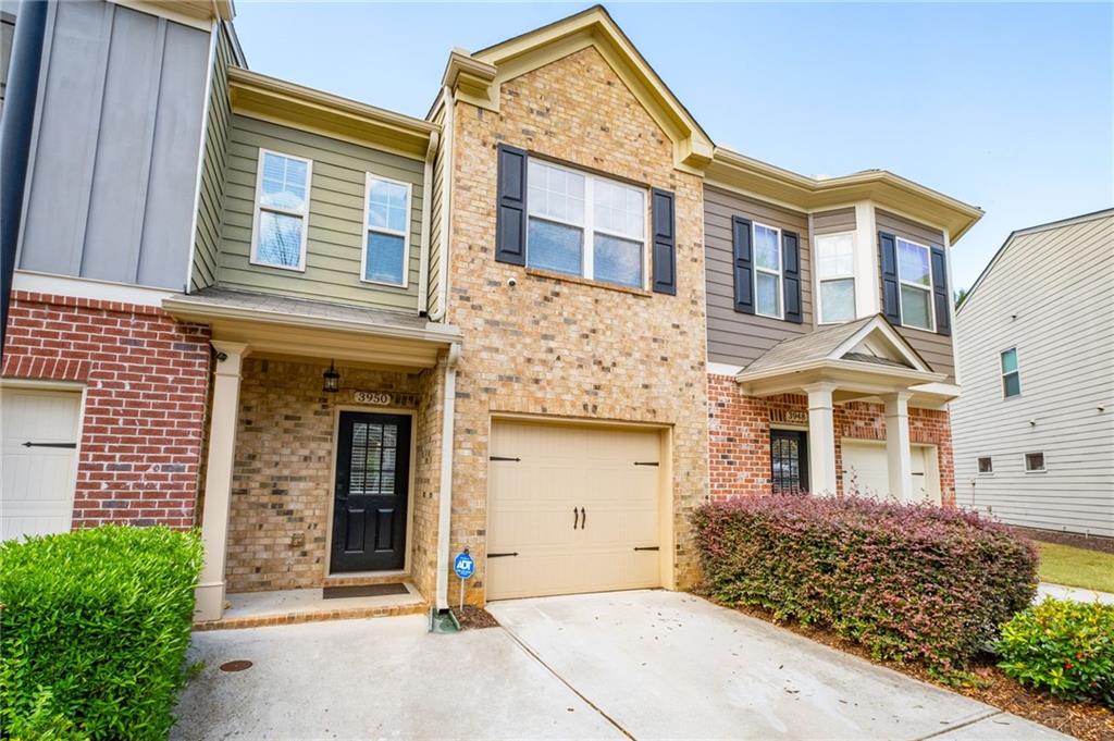 Welcome to this beautifully maintained and thoughtfully upgraded townhome offering spacious living in a quiet, well-kept community in the heart of Kennesaw. This rare opportunity features brand new hardwood floors on the main level and stairway, quartz countertops, tile backsplash, and stainless steel appliances including an electric range, microwave, dishwasher, and garbage disposal. The oversized island is perfect for food prep, entertaining, or casual dining. The open-concept layout boasts 9-foot ceilings on both levels, allowing for natural light and an airy feel throughout the living, dining, and kitchen areas. Step out to your private backyard and patio—a perfect space for pets, outdoor dining, or quiet relaxation. Upstairs, enjoy brand new carpet throughout, laundry closet, and a generously sized primary suite featuring en-suite bath with double vanity, soaking tub, walk-in shower, and large walk-in closet. Two additional bedrooms and another full bathroom provide flexibility for guests, family, roommates, or home office needs. This home is positioned on one of the larger lots in the neighborhood and is ideally located just minutes from KSU, Downtown Kennesaw, shopping, restaurants, parks, and major highways. The low HOA fee includes access to a community pool, playground, and front yard landscaping. Additional bonuses: new light fixtures, outdoor utility closet for additional storage, zoned to top-rated schools and walkable to restaurants and retail. Buyer Incentives Available – Ask for Details! Don’t miss your chance to own one of the most upgraded townhomes in this desirable community—schedule your showing today!