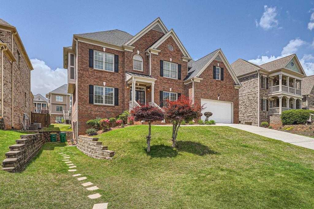 GORGEOUS Home in the Prestigious Johns Creek Area! Beautiful 3 Side Brick Home with Hardwood Floors, Soaring 2-Story Foyer, Formal Living & Dining Rooms, and a Light-Filled 2-Story Family Room with Cozy Fireplace & Wall of Windows Overlooking the New Deck and Large Backyard. The Gourmet Kitchen Features a Center Island with Stove top and Built-In Vent, Granite Countertops, Brand-New Refrigerator and Dishwasher, Stainless Steel Appliances, and an Open View to the Living Room for seamless flow. Guest Bedroom and FULL Bath on Main Level. Upstairs Boasts a Stunning Owner’s Suite with Trey Ceilings, Upgraded Carpet, Spa-Like Bath with Double Vanity, Garden Tub, Separate Shower, and Walk-in Closet. Generously Sized Secondary Bedrooms and a Well-Designed Layout. Zoned for TOP-RATED Barnwell Elementary, Autrey Mill Middle, and Johns Creek High! Close to Parks, Shopping, Restaurants, and Walking Trails