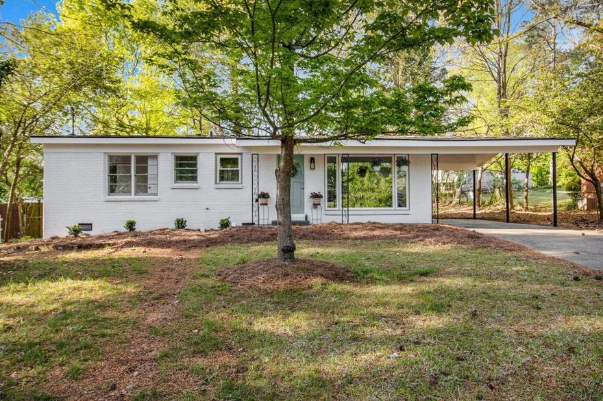 Fully Renovated Brick Ranch in an unbeatable Marietta location! Just minutes from Marietta Square, The Battery, Vinings, Shopping, Dining, Entertainment, and with Easy Highway Access, this home puts you in the heart of it all. Step inside to discover a Flowing Floor Plan featuring Refinished Original Hardwood Floors and a Light-Filled Family Room with a Large Picture Window. The Eat-In Kitchen boasts White Shaker Cabinets, Granite Counters, a Subway Tile Backsplash, and Stainless Steel Appliances perfect for both everyday living and entertaining. The Primary Bedroom includes a Private Ensuite Bath with a Large Frameless Tiled Shower. Two Additional Bedrooms share a stylishly updated Hall Bathroom. Enjoy outdoor living on the Rear Patio overlooking a Large, Flat Backyard ideal for relaxing, entertaining, or play. This Move-In Ready gem offers Timeless Charm with Modern Updates in a Prime Location!