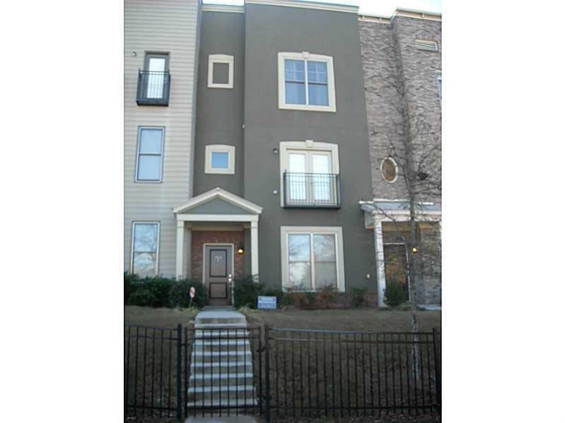 IN TOWN LIVING AT IT'S FINEST. BEAUTIFUL BROWNSTONE WITH 3 LEVELS OF LIVING SPACE AT THE HISTORIC WESTSIDE VILLAGES. URBAN LIVING FOR THE YOUNG PROFESSIONALS, CLOSE TO GA DOME, DOWNTOWN & MARTA. 3BR/3.5BA, GRANITE C'TOPS & HARDWOOD FLOORING ROOMATE FLOOR PLAN. AMENITES INCLUDE FITNESS CENTER/POOL/CLUB HOUSE & SECURITY GATE.