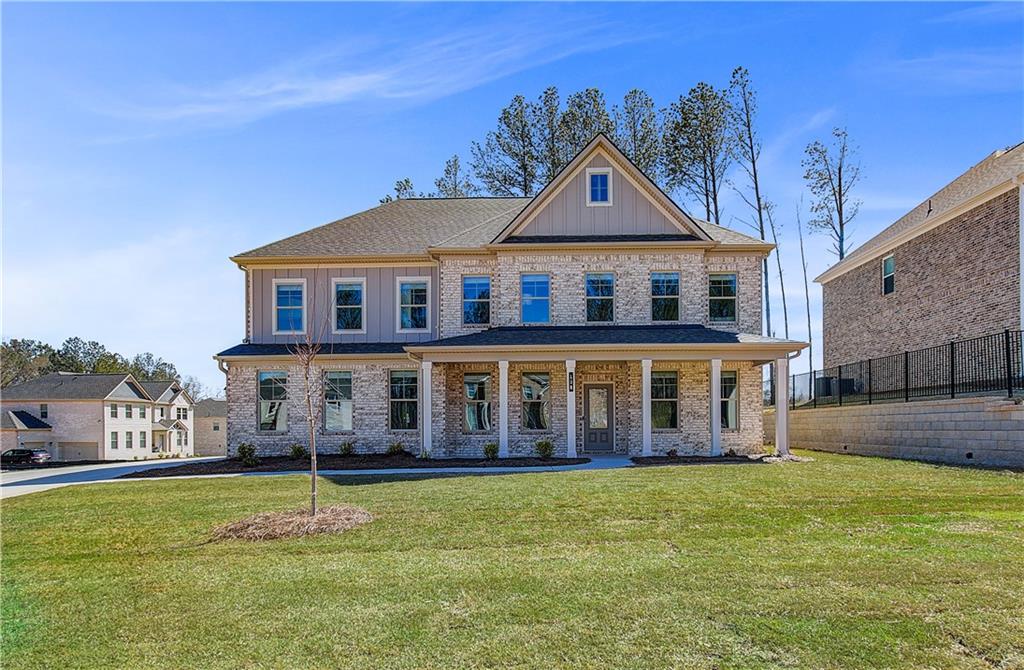Welcome to Cambria at Traditions by DRB Homes in the desirable Hampton, GA area within Henry County. This beautifully crafted single-family home features a charming craftsman-style exterior and leaves no detail overlooked.
The spacious Stonefield plan, located on Homesite 5, offers 5 bedrooms and 3.5 bathrooms. The main level includes an open kitchen and family room concept with a large island, and an office/study and powder room.
Upstairs, you’ll find a versatile loft area, three generously sized secondary bedrooms, and a grand owner’s suite. The owner’s suite includes a luxurious spa bath with a soaking tub, a separate shower, and a walk-in closet.
Please note that the photos provided are stock images and do not represent the actual home. Contact us today to learn more and follow the progress of your future home!
Please note: If the buyer is represented by a broker/agent, DRB REQUIRES the buyer’s broker/agent to be present during the initial meeting with DRB’s sales personnel to ensure proper representation. If buyer’s broker/agent is not present at initial meeting DRB Group Georgia reserves the right to reduce or remove broker/agent compensation.