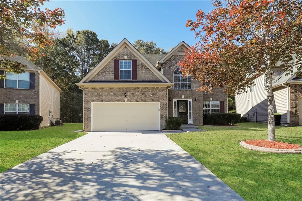 This spacious 4-bedroom, 3-bathroom pet-friendly home offers 3,365 sq ft of comfortable living space. The kitchen is equipped with stainless steel appliances, including a refrigerator, microwave, and range oven. Enjoy the convenience of an attached garage and stay cool with ceiling fans throughout. Window coverings add an elegant touch to the interiors. Relax in one of the three bathrooms, featuring a bathtub for your comfort. This home is ready to welcome you with its blend of comfort and functionality. Schedule a tour today!