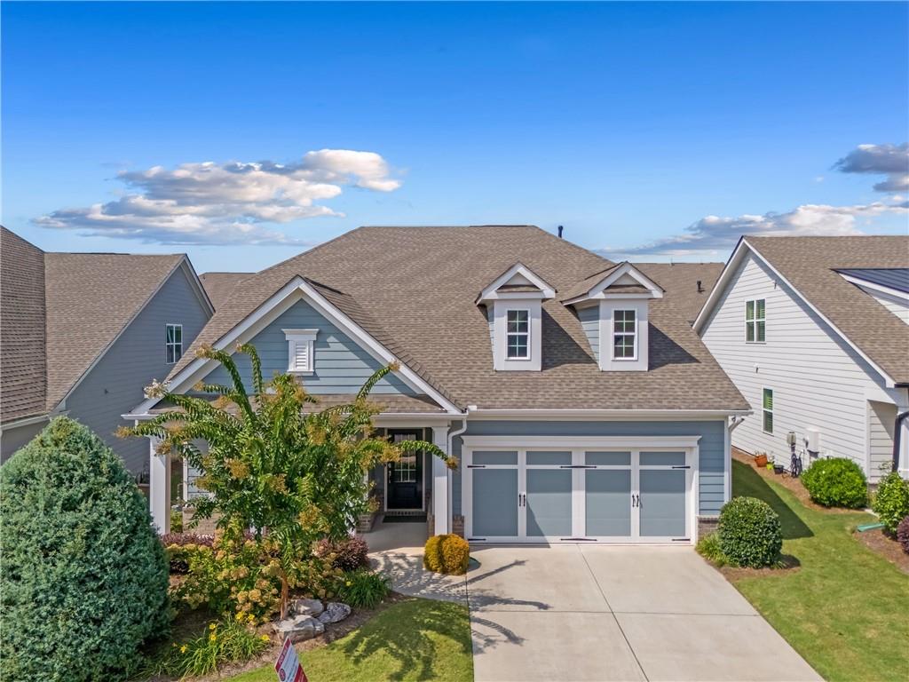 Welcome to this stunning 4-year-old home in one of Canton’s most desirable active adult communities, where resort-style living meets everyday comfort. Just steps away from a walk-in pool, 17,000 sq. ft. clubhouse with endless activities, tennis, and pickle ball courts, you’ll enjoy a vibrant lifestyle right outside your door.
Inside, this thoughtfully designed home offers 2 bedrooms plus a versatile flex room, perfect for a home office, craft space, or guest retreat. The open floor plan is ideal for entertaining, featuring a fireside family room that flows seamlessly into the stylish kitchen with gray cabinetry, quartz countertops, and a huge walk-in pantry.
Relax and unwind on the screened porch, overlooking beautifully manicured grounds enhanced by over $10,000 in additional professional landscaping. Every detail has been carefully chosen to blend function and beauty, creating a home that is both welcoming and low-maintenance.
Don’t miss the opportunity to experience this exceptional home and community—schedule your private tour today!