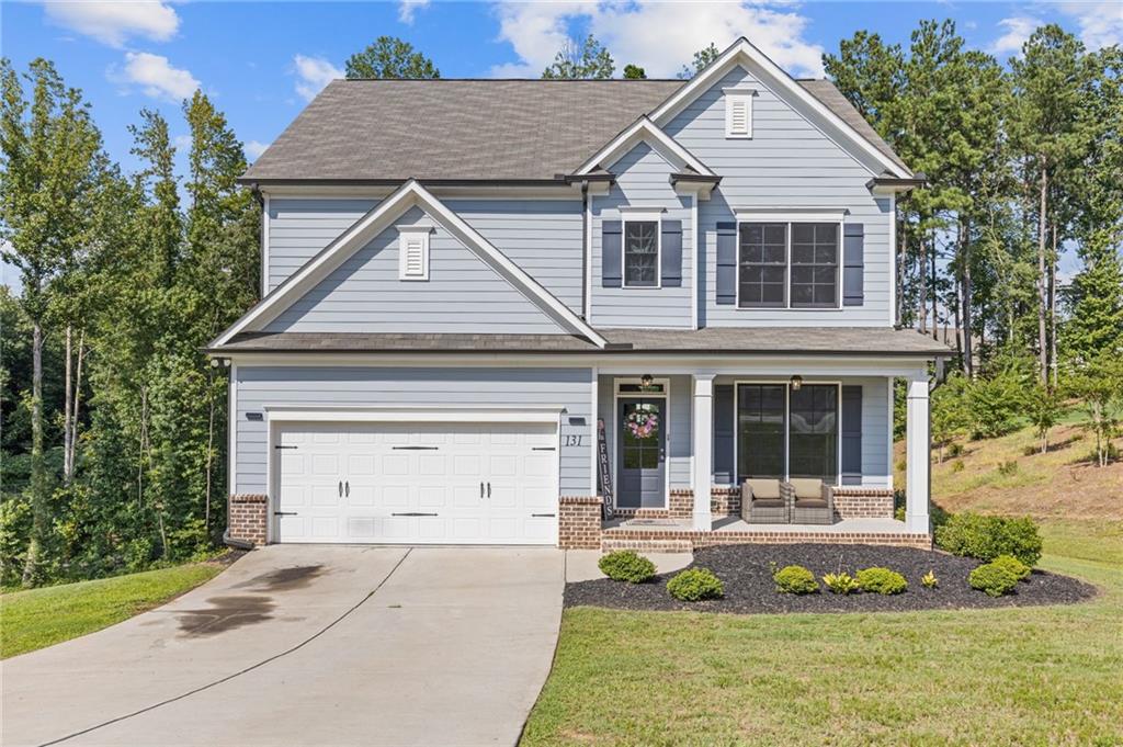 Welcome to this beautifully maintained 4-bedroom, 2.5-bath residence nestled in a quiet Winder neighborhood. Step inside to discover an open-concept layout that seamlessly combines comfort and style. The heart of the home boasts a modern kitchen featuring white cabinetry, sleek granite countertops, and a spacious center island—perfect for cooking, gathering, and making memories.