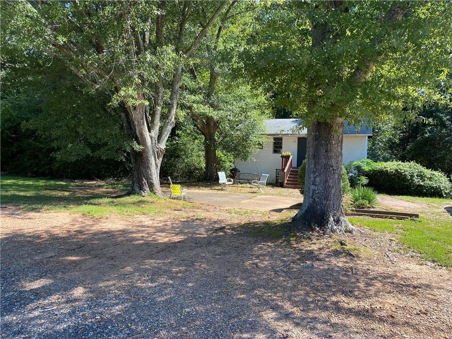 4+ acres of land in City of Milton.  2bed/1bath home is currently rented, please do not disturb tenants, call for appointment to view