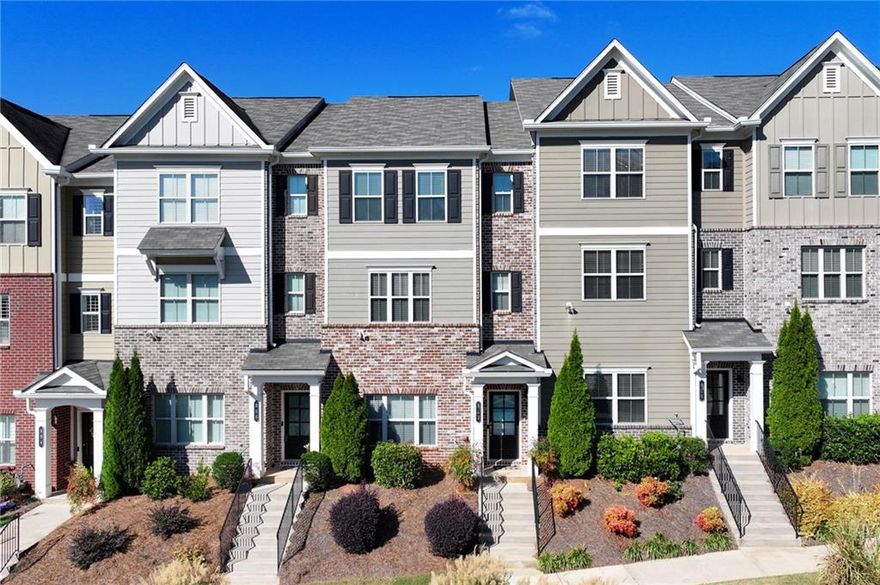 Welcome to North Square! 
Discover this stunning 3 bedroom, 3.5-bath townhome just minutes from Historic Marietta Square. Blending comfort, style, and convenience, this move-in ready home offers the perfect lifestyle.

From the moment you walk in, you’ll notice the bright open layout and beautiful hardwood floors throughout. The chef’s kitchen features quartz countertops, premium appliances, and plenty of cabinet space — all flowing seamlessly into the spacious dining and family areas, perfect for everyday living or entertaining.

Upstairs, the primary suite boasts a spa-like bath, an oversized shower and a walk-in closet. Additional upgrades include crown molding, iron stair railings, a finished two-car garage, and plenty of storage.

Enjoy community amenities — sparkling pool, fire pit, and dog park — or take a short stroll to the Square for dining, shopping, festivals, and concerts. With Kennestone Hospital, Kennesaw Mountain trails, and easy interstate access nearby, this home truly has it all.

This rare gem offers the perfect mix of charm, convenience, and freedom — don’t miss your chance to make it yours!