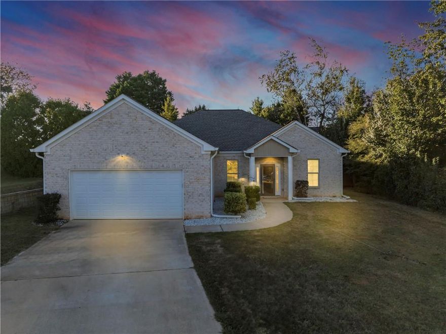 Priced to Move!  Step into your dream ranch-style retreat nestled in the highly sought-after Wesley Lakes community. This modern, ranch-style home built in 2022 blends fresh construction with timeless design and high-end finishes. Offering 4 spacious bedrooms and 2.5 baths, the layout is open, functional, and perfect for both everyday living and entertaining.

The home showcases beautiful curb appeal with a brick front and contemporary exterior details. Inside, you’ll find an open-concept kitchen and breakfast area with a large central island, ideal for gathering with family and friends. High ceilings and large windows fill the space with natural light, creating a warm and welcoming atmosphere throughout.

The primary suite is conveniently located and features a private bath along with a split floor plan for added privacy from the secondary bedrooms. An attached two-car garage adds everyday convenience, while the newly added spacious patio and custom retaining wall transform the backyard into an outdoor oasis, perfect for relaxing or entertaining guests. 

Located just minutes from shopping, dining, and major highways, this home combines comfort, style, and location in one of McDonough’s most desirable communities.
