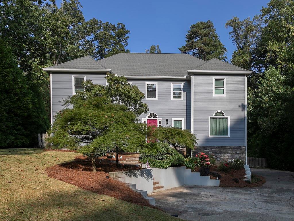 Welcome to your dream home in the highly coveted Old Paper Mill neighborhood, where luxury, comfort, and community come together in one perfect package. Just a short walk to the scenic Sope Creek National Park trails and located in the award-winning Sope Creek Elementary School district, this home offers both prestige and convenience. The chef’s kitchen is the heart of the home and designed for those who love to cook and entertain. Enjoy the NXR PRO Series Gas Range with six German dual-power burners (90,000 BTUs total), GE Profile 27" built-in combination convection microwave and wall oven, slate cabinetry, and commercial vent hood. A chic wet bar off the foyer adds a stylish touch, making hosting effortless. The upstairs primary suite is a private retreat, featuring a spa-inspired bath with soaking tub, oversized shower with basketweave marble tile, and luxurious finishes. Upstairs laundry means convenience is built into daily living. The finished basement adds versatility with a full bathroom, creating the perfect space for guests, recreation, or a home office. This home has been beautifully updated with newer Low-E double-pane windows and doors, newer roof and gutters. Step outside and escape to your own resort-style backyard oasis. The fully fenced outdoor space is built for fun and relaxation with an awesome heated saltwater POOL, playground and cedar pergola. Whether you’re entertaining friends or enjoying a quiet evening at home, this backyard has it all. Old Paper Mill offers more than just a great location—it’s a lifestyle. The HOA includes swim and tennis, giving you access to top-tier amenities and a welcoming community. With convenient access to I-75 and I-285, you’ll enjoy an easy commute while living just minutes from shopping, dining, and recreation. This home is the complete package: luxury finishes, thoughtful updates, resort-style outdoor living, and one of East Cobb’s most desirable neighborhoods. Don’t miss the opportunity to make it yours!