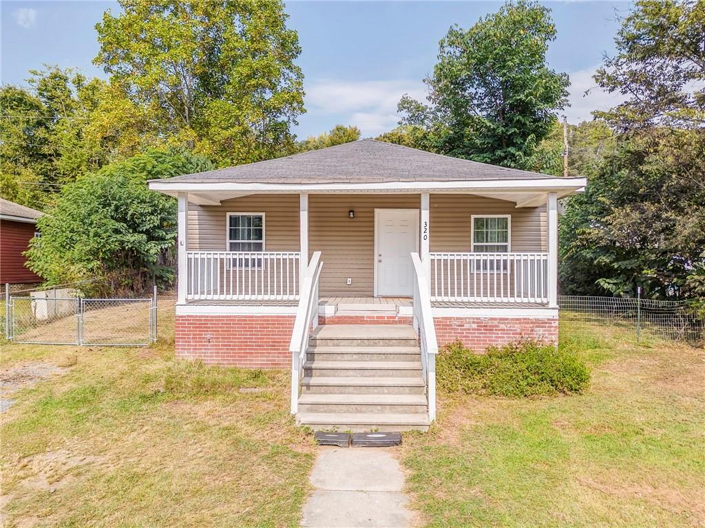 Totally remodeled 2 years ago, this 3 bedroom 2 bath home is a must see in the Shannon Village. Solid surface countertops and an open concept from the kitchen to the living room. The front porch offers ample space for seating and the park near by is just a short walk away. Call today for an appointment to see this cottage that is close to Rome & Calhoun!