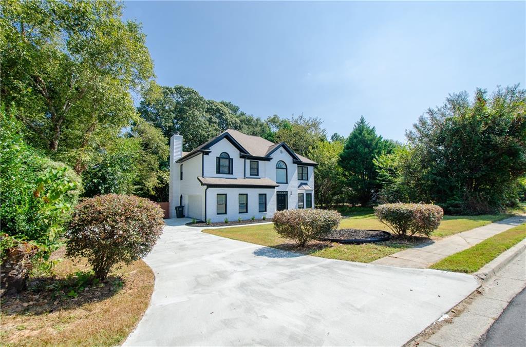 Beautifully Renovated 5 Bedroom 3.5 Bath Brick Front Home In The Archer School District! Long And Level Driveway Welcomes You Inside This Bright, Full Of Natural Light Home. Hardwood Floors And New Lighting Fixtures Create A Uniformed Flow Into The Chef's Kitchen That Features New Cabinetry, Stone Counter And Backsplash, SS Steel Appliances, Farmhouse Sink And A Large Island With A Breakfast Area. The Family Room With An Elegant Fireplace Ties All The Living Spaces Together For A Practical Open Concept Layout Excellent For Entertaining. Upstairs, The Spacious Bedrooms Upstairs All Have New Hardwood Floors And New Lighting Fixtures. The Master Suite Boasts Double Vanities, A Walk In Shower And A Stand Alone Tub. Outside There is A Level, Fenced Backyard Perfect For Kids, Pets And Entertaining. Do Not Miss Out On This House!