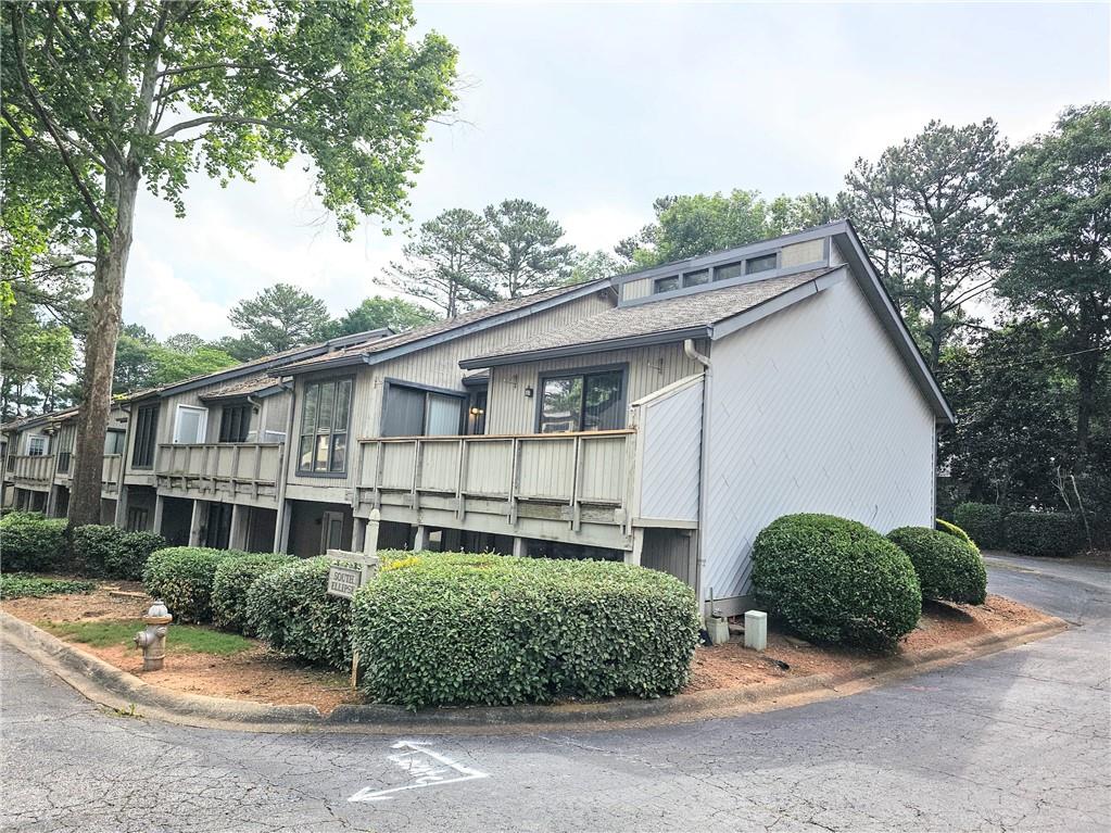 Fully renovated townhouse in a sought after location near the interstection of Lower roswell - Johnson Ferry road. This unique floor plan has vaulted ceilings on the main floor. Brand new kitchen with open access to the living area and to the outside deck. The formal dining area is next to the kitchen.There are two living rooms on this house, each floor has a living room with fireplace. Master bedroom is upstairs and it has a brand new bathroom that connects to the hallway. Downstairs area has a large living area and a bedroom with full bath with outside access. The powder room is on the lower level. The subdivision is going through a major renovation, which will see property values go up very soon.
There is no seller's disclosure. This is a flip. Listing agent is a principal for the entity that owns the property and will sign on its behalf. Closing with Weissman Law firm.
The seller has already covered a $25,000 special assessment —at no cost to you! This includes upcoming upgrades like: siding repair, pool repair, asphalt work and professional tree removal.
As a result, property values are expected to rise, making this not just a home, but a smart investment —all the benefits, none of the cost!