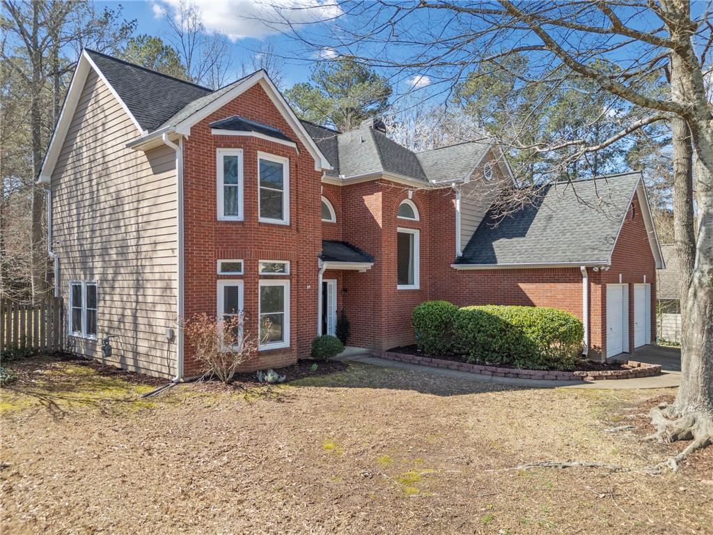 7104 Big Woods Drive, Woodstock, Georgia image 2