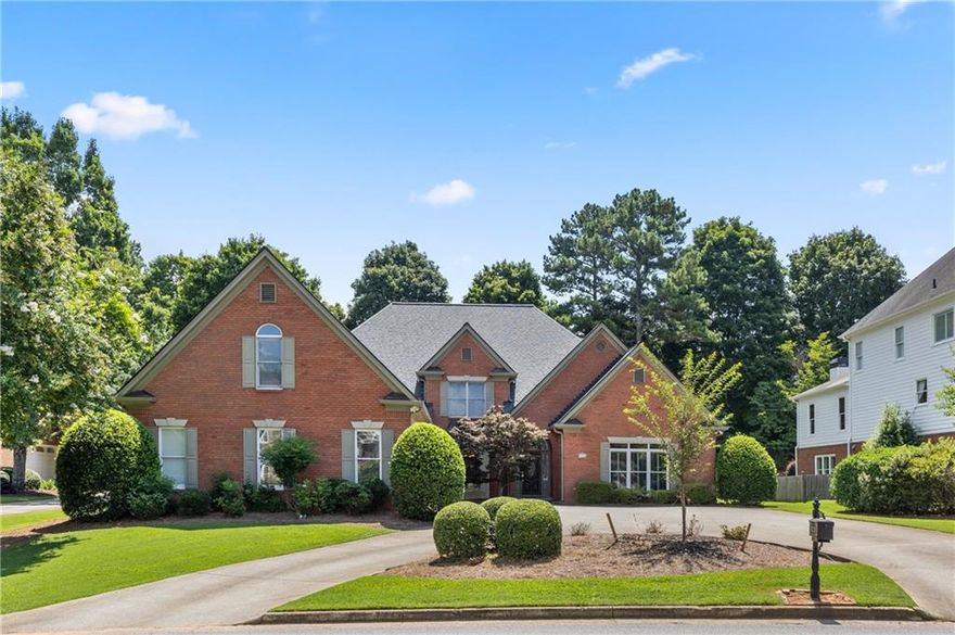 Incredible Opportunity in the Coveted Nesbit Lakes Community!  
This stunning four-sides brick home offers a spacious and thoughtfully designed open floor plan. The inviting entry foyer is flanked by a formal dining room and formal living room, and flows seamlessly into the dramatic two-story grand room with fireplace—perfect for entertaining. The chef’s kitchen is a true standout, featuring stainless steel appliances,  new soft close cabinetry, stylish backsplash, and a sleek vent hood. Gleaming hardwood floors run throughout the main level. The expansive primary suite is conveniently located on the main floor and boasts an updated spa-like bathroom with granite-topped double vanities, an oversized double-headed shower, and custom his-and-hers closets. Two additional bedrooms on the main share a full bath, and there's also a half bath for guests. Upstairs offers even more space with a loft area, a private office, two additional bedrooms each with en-suite baths, a second half bath, and a large bonus room—ideal for media, playroom, or workout space. Additional highlights include a 2-year-old roof, 3 new HVAC systems, a 3-car side-entry garage, a Circular driveway, and a Fenced backyard with screened porch and 2 brick paver patios. Abundant storage throughout!  Enjoy resort-style living with fantastic community amenities including swim, splash park and kids pool,  tennis courts , pickleball courts, clubhouse, playground, fire pit area  and access to 2 large scenic lakes. Conveniently located within walking distance to top-rated private and public schools and  easy access to GA 400, Historic Roswell, Downtown Alpharetta, and Avalon.