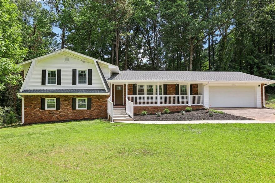 Welcome to this charming home that represents the epitome of modern living while seamlessly blending comfort, elegance, and a touch of rustic charm. As you approach the residence, you are greeted by the stately front of the house, which showcases a well-maintained façade inviting you toward the front porch. This front porch serves as an ideal spot to unwind, providing an inviting space for leisurely mornings or quiet evenings.

Upon entering through the front entrance, you step into a spacious foyer that acts as the gateway to this delightful home. The foyer's layout provides a warm welcome and sets the stage for the interiors that follow. Beyond the foyer lies a magnificent living room that features an open concept design, promoting a sense of togetherness and flow. This impressive living room, adorned with stylish accents and an abundance of natural light, invites casual gatherings and entertaining opportunities, creating an atmosphere that is both relaxing and inviting. 
Adjacent to the living room, the dining room continues this theme of openness, providing an elegant space for family dinners and celebrations. This area is significantly enhanced by its proximity to the kitchen, which boasts exquisite Quartz countertops that not only add a touch of sophistication but also promise durability for daily tasks. The well-designed kitchen is a culinary enthusiast's delight, featuring ample cabinetry, a modern layout, and a pantry that adds convenience to your cooking experience. Multiple angles of the kitchen provide insights into its thoughtful design, showcasing both functionality and aesthetic appeal.

A significant highlight of this property is the inviting sunroom that beckons you to bask in sunlight & nature, perfect for enjoying leisurely afternoons, enjoying a morning coffee or relaxing in tranquil nature.
Venturing upstairs, you will encounter the fabulous primary bedroom, a serene retreat designed for relaxation. This generously proportioned room offers a sanctuary-like ambiance, complemented by carefully chosen décor and natural light filtering through the windows. The primary bath is a true gem, featuring sophisticated fixtures and finishes that elevate your daily routine into a lavish experience. The combination of functionality and luxury in this space is second to none, ensuring comfort and style.

Also you will find the 2nd and 3rd bedrooms that offer their own unique charm, providing ample space for family, guests, or even a home office. The upstairs hall bath serves these bedrooms with convenience, featuring thoughtfully designed elements that cater to both comfort and practicality.

The lower level of the home is equally impressive, featuring a fully equipped kitchen that’s perfect for entertaining or serving as a space for your culinary creations when hosting larger gatherings. This level also houses a fourth bedroom and a fifth bedroom, ideal for guests or family members who enjoy a bit of privacy. A full bath completes this lower level, adding further convenience and comfort for any visitors, in-laws or grown children.

Adding to the functionality of this home is the extra-large garage, providing ample space for vehicles, storage, and additional workshop needs. The back of the house presents a sprawling backyard area, an oasis for outdoor activities and relaxation. This expansive outdoor space can easily accommodate social gatherings, play areas, or serene retreats, surrounded by nature’s beauty.

Overall, this well-appointed property offers a harmonious blend of comfort, style, and practicality, making it the perfect choice for modern living. From the welcoming front porch to the versatile lower level and stunning outdoor area, every corner of this home speaks to quality and care. Welcome, and begin your journey in this splendid residence where countless memories await to be made.
BUYERS TO CONFIRM ACCURACY OF ALL DETAILS. PLEASE REMOVE SHOES or USE SHOE COVERS PROVIDED .