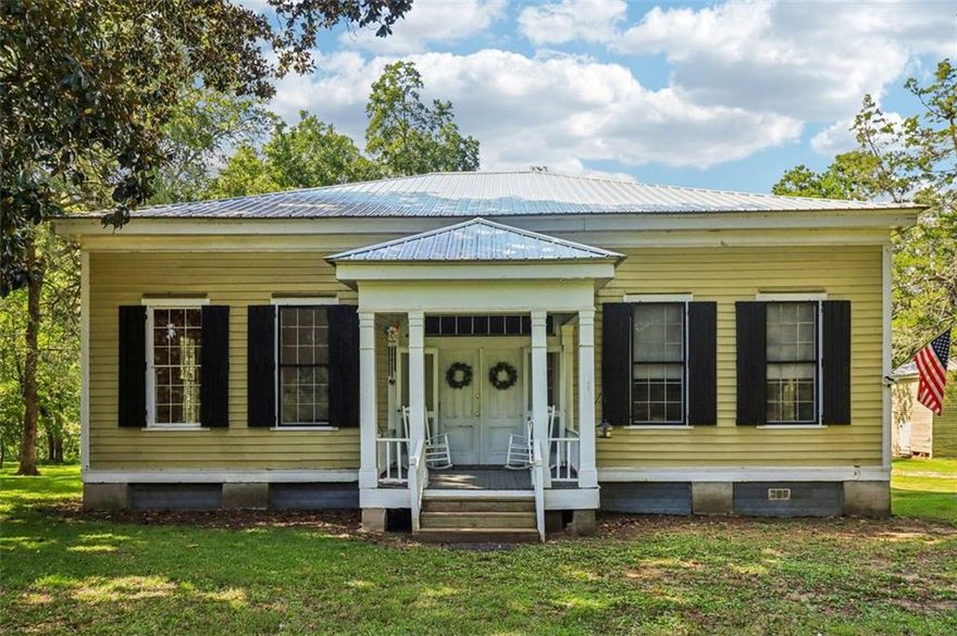 Step back in time with this stately 1800s Southern farmhouse on 5 acres, with an additional 15 acres available. This isn't just a house; it's a piece of history where timeless character meets modern comfort.
Inside, you'll find original heart pine floors, 14 ft ceilings, and beautiful windows, creating a sense of grandeur and space. The rocking chair front porch invites you to slow down and enjoy the simple pleasures of country living.
This home has been lovingly updated for today's lifestyle, boasting a brand-new metal roof, updated HVAC, and beautifully renovated kitchen and baths, including a clawfoot tub for soaking up the peaceful vibes.
Located on a quiet dirt road just off Hwy 129, the property offers several acres of green pasture, pecan grove, and mature hardwoods. You'll feel a world away, yet you're just a quick drive from Macon, Gray, Eatonton, Milledgeville, and Lake Sinclair. 
If you’ve been searching for a historic farmhouse that offers space, beauty, and versatility, this is a rare opportunity to own a piece of the past and build future dreams. Whether you want a small farm, a horse property, or even a charming venue, call today and let's make this your home. ~
