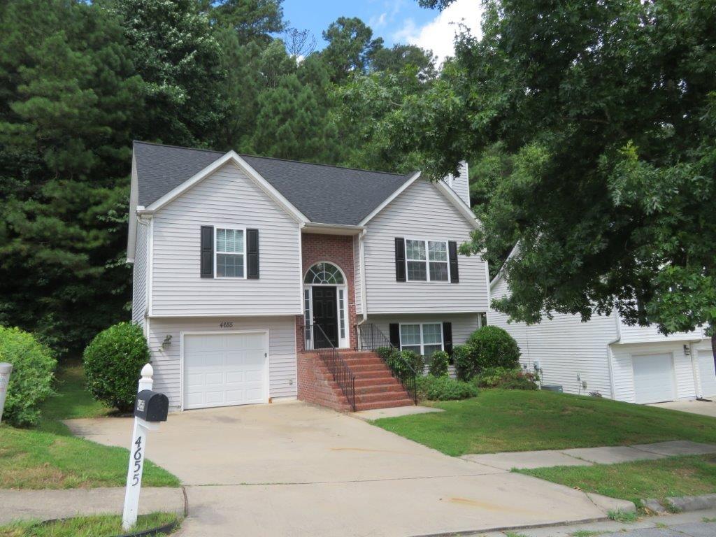 Beautiful, split foyer home in Creekside at Scarborough! Brick accents! Spacious family room with fireplace and vaulted ceilings! Separate dining room! Kitchen features white cabinets and black and SS appliances! Two spacious bedrooms upstairs with a full bathroom! Finished basement/lower level provides one additional bedroom and full bathroom! Rear deck for relaxing! A must see! Don't miss out!