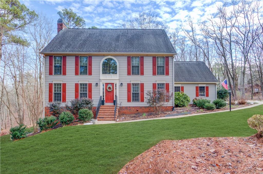 Set on almost 2 private acres, this gorgeous traditional home offers the perfect blend of peace, privacy, and convenience! Nestled among mature trees, you’ll love spending hours by the firepit, relaxing and soaking in the beauty of your natural surroundings. Step inside the grand 2-story foyer and you’ll immediately notice the well-maintained interiors featuring wood floors and a classic, flowing floorplan. To your right, a formal dining room is perfect for holiday gatherings and is conveniently connected to the updated kitchen by a Butler’s pantry. The kitchen boasts granite counters, stainless appliances (including a gas range), abundant storage, a massive pantry, and beautiful views of the private backyard — a dream for any home chef! The spacious family room is centered around a huge brick, wood-burning fireplace, while the inviting sunroom offers the ideal spot to relax with a book or your favorite beverage. From there, step out onto the back deck to grill or simply enjoy the peaceful setting. Upstairs, the light-filled Owner’s suite features an en suite bath complete with a whirlpool tub, separate shower, and double vanity. The generously sized secondary bedrooms offer plenty of space and storage, and there’s even a finished bonus room perfect for a home office or additional bedroom! The basement is partially finished, offering entertainment space, a bathroom, and additional storage — ideal for flexible living needs. This home truly feels like a retreat, with plenty of room to spread out both inside and out!