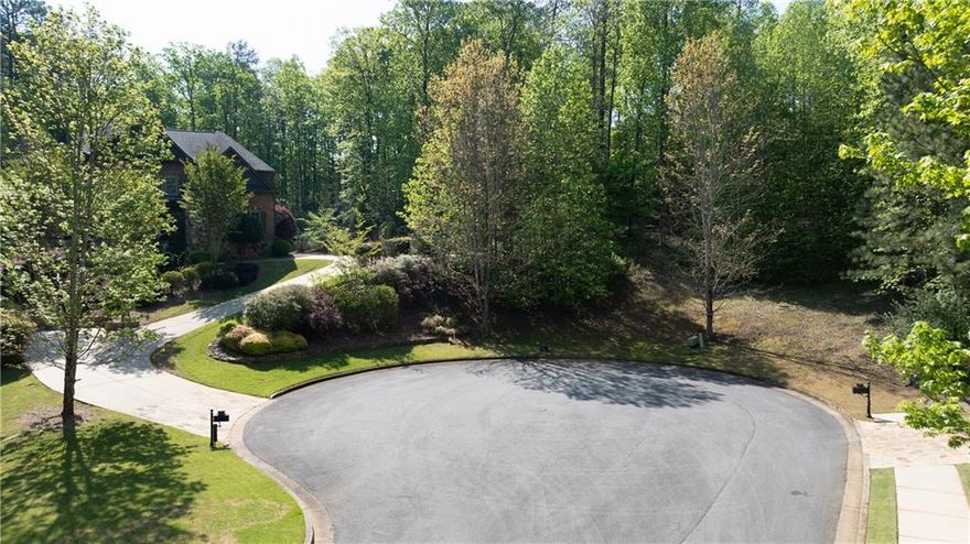 Exceptional Opportunity in Anderson Farm. Build your dream home in the highly sought-after Anderson Farm community. This tranquil lot offers scenic views of Kennesaw Mountain and is the perfect setting for your custom home. Included in the listing documents are three different plats, one of which clearly outlines the buildable area. This lot is adjacent to 310 Anders Path, a stunning custom home also currently available for sale. Located just a couple of miles from the vibrant and charming Marietta Square, Anderson Farm is a well-established community known for its beauty, privacy, and architectural integrity. For those seeking additional space or investment potential, there is a rare opportunity to purchase 306, 310 and 314 Anders Path—all under the same ownership.  Architectural controls and neighborhood covenants help preserve the community’s character. Copies of the covenants are available upon request