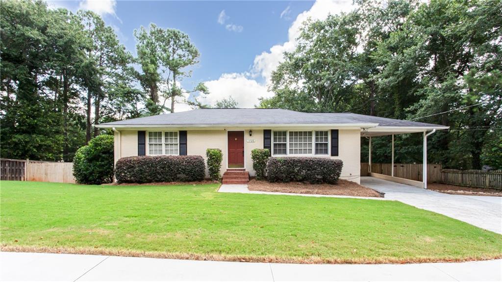 Renovated, 4 sides brick, ranch nestled on beautiful level lot. NO HOA. Meticulously maintained with many upgrades. All hardwoods on the main were refinished just prior to listing. Kitchen features newly finished cabinets, stainless steel appliances, granite countertop, island. Open concept on main floor with dining room and living combo. Southern living at its finest with custom covered patio out back with cedar accents. Great spot to entertain with family and friends. Oversized master bedroom. Home office on the main. Stunning finished basement w/ new carpet, new paint, large game room with bar area, private bedroom and full bathroom suite. Spacious backyard w/ firepit area. Lot completely fenced in with gate at the entrance to driveway. Sale includes the original .3 acres along with .13 acres to the right of the home that was purchased by the owner a few year ago.