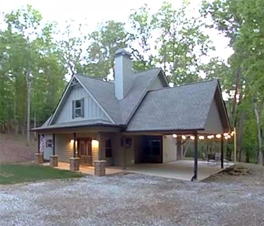 Enjoy your dream home in Cleveland, GA - a cozy 1550 sq ft house with three bedrooms and 2.5 bathrooms on a private road, with no HOA, located in a peaceful private setting. The primary bedroom is on the main floor for convenience. Upstairs, you'll find an office and large walk-in closets throughout. The home includes laundry facilities, all appliances, and plenty of storage space, it also has a split HVAC unit with two thermostats for upstairs and downstairs. Beautiful outdoor entertaining area and firepit. The property features its own creek on the back of the property (located down the hill behind the firepit area) and deeded river access within walking distance (turn left out of driveway, around the curve and down the hill), a great place for swimming, fishing, tubing or kayaking. Nearby attractions include the town of Helen, North Georgia Mountains, Yonah Mountain Vineyards, and Apple Mountain Resort & Golf Club. This house offers the perfect blend of comfort and natural beauty, ideal for creating a peaceful lifestyle while maintaining access to local amenities. Whether you love outdoor adventures or simply relaxing at home, this property delivers everything you need in a simple, maintenance-friendly package. SHORT TERM RENTALS ALLOWED. Home has private well and septic tank and HIGH SPEED fiber Trailwave Internet is available through HEMC.