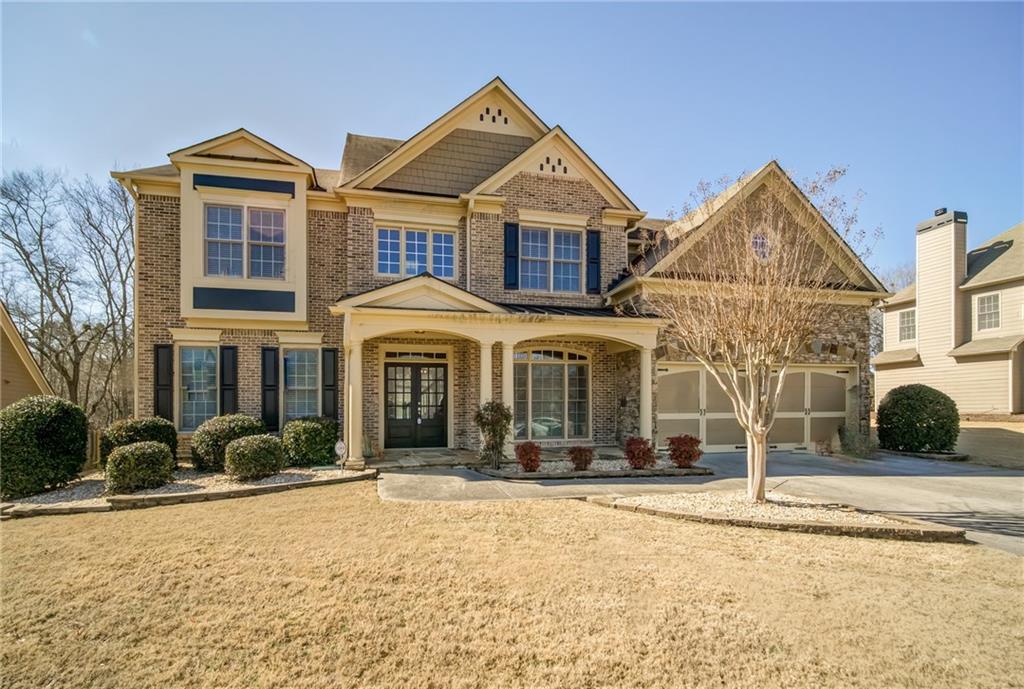 Welcome to your LAKE VIEW home in the Swim/Tennis community of Lakefield Manor. Throughout you will find gleaming hardwoods and
professionally cleaned carpets. The grand main level boasts a guest Bedroom, full bath, formal Livingroom & Dining room, family room w/fireplace & built-ins off of a grand gourmet kitchen. Kitchen is loaded with wood cabinets, granite counter tops, SS appliances & walk-in pantry. Breakfast bar island with
ample storage and breakfast area. Upstairs is a spacious master bedroom suite with tiled master bath, soaker tub, abundance of vanity counterspace and oversized walk-in closet. 4 large secondary bedrooms with walk-in closets, 2 tiled bathrooms and an additional bonus room! Outside the level, landscaped
yard is professionally maintained with irrigation system plus a patio, gazebo with deck, and multi-purpose building both with electricity. 2 sets of Full amenities (Pools, tennis courts, and playground) are within walking distance along with lakefront access. EV charging available in the 2-car garage. Professionally cleaned and ready for move in! Not to mention miles & miles of exploring in the nearby Kennesaw Mountain National Park, quick access to the East-West Connector & Hwy 120, plus countless entertainment options in the quaint Downtown Marietta Square.
