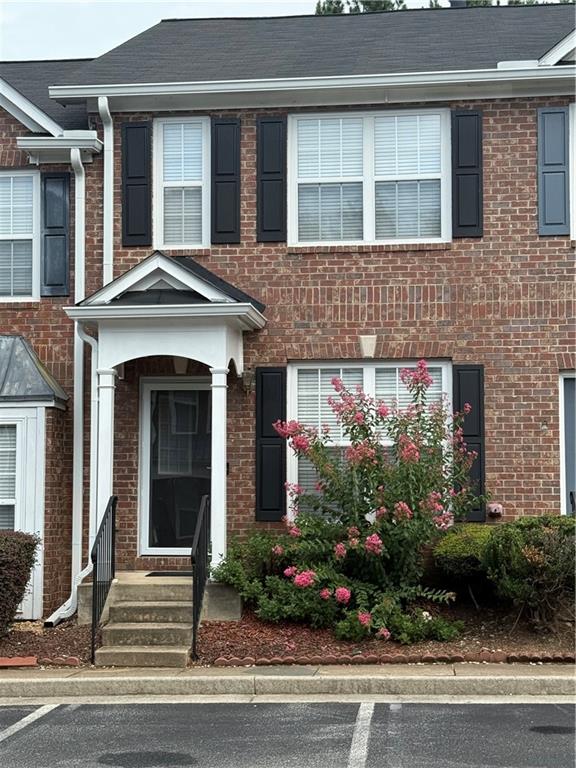 Welcome to 270 Paden Cove Trail – a beautifully maintained 2-bedroom, 2.5-bath townhome located in a quiet, well-kept community in Lawrenceville. This home offers a bright, open layout with a spacious living area, separate dining space, and a kitchen with plenty of cabinet storage. Both bedrooms feature en-suite bathrooms and generous closet space. Enjoy a private back patio and two assigned parking spots right out front. Just 10 minutes from downtown Lawrenceville, with easy access to shopping, dining, and everyday essentials. Partially furnished. Ready for immediate move-in – schedule your tour today!
