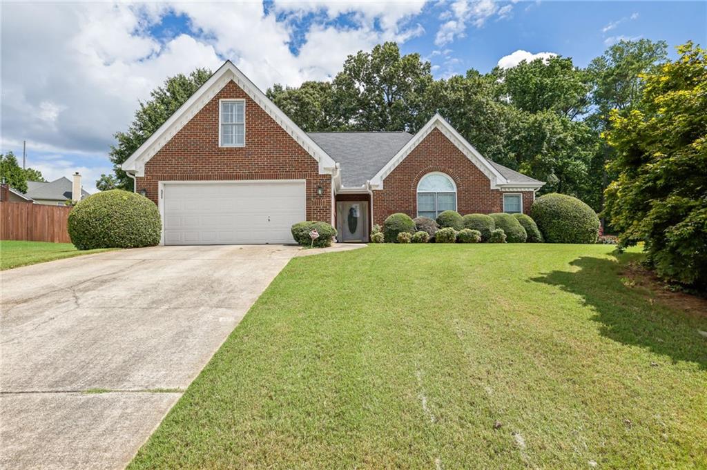 Welcome to this beautifully maintained 4-bedroom, 2-bathroom home ideally situated just minutes from Scenic Hwy, GA-20, Sugarloaf Parkway, and a wide variety of local dining and shopping options in Lawrenceville.
Nestled on a spacious and beautifully landscaped lot, this home offers the perfect balance of comfort and convenience. The main level features a generously sized primary ensuite, providing easy access and privacy. Additional highlights include a 2-car garage and ample living space for family and guests.
Whether you're relaxing indoors or enjoying the expansive yard, this home has something for everyone. Don’t miss the opportunity to own a home in one of Lawrenceville’s most accessible and desirable locations!
Discounted rate options and no lender fee future refinancing may be available for qualified buyers of this home