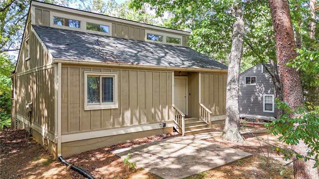 Welcome to 137 Narrows Loop – where thoughtful design meets exceptional quality in the heart of Lake Arrowhead, GA.
Meticulously renovated from top to bottom, this stunning 2-bedroom, 2-bath home with a spacious sleeping loft offers a seamless blend of modern elegance and comfortable living—perfectly situated to take advantage of seasonal lake views.
Step into a bright, open-concept interior featuring designer selections throughout, from exquisite flooring and stylish lighting to sleek contemporary finishes. The primary suite with spa-like en-suite bathroom exceeds expectations in both luxury and comfort. The chef-inspired kitchen is a true showpiece, appointed with granite countertops, upgraded appliances, and abundant space for cooking and entertaining.
Nestled in Lake Arrowhead, a gated, mountain-lake-golf community in Cherokee County. Here you will find a clubhouse, tennis & pickleball courts, two swimming pools, 8+ miles of hiking trails, and multiple parks including Lakeside & Red Cloud, 24-hour gated security, community clubhouse, chapel, and fire department.
This property is more than just a home—it’s an income-producing gem, designed by the owner for personal enjoyment first and foremost. Whether you're looking for a primary residence, a serene second home, or a proven rental investment, 137 Narrows Loop is turnkey, versatile, and ready to impress.