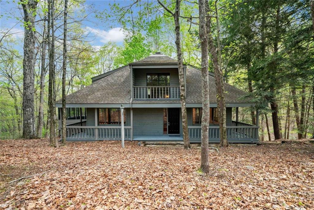 Welcome to this beautifully updated 4BR/3BA home in the desirable Big Canoe gated community one hour from Atlanta, GA. Sitting on 0.91 acres with 2,541 sq ft, it features fresh paint, new HVAC, carpet and flooring, stainless steel appliances, granite countertops, hardwood floors, and double-sink vanities. Two bedrooms offer walk-in closets, and large picture windows flood the home with natural light. The main floor includes a master bedroom with en-suite bathroom. Enjoy a living room and a bathroom on each of the three levels, plus a flat driveway for multiple cars. STR allowed! Wraparound and screened-in porches. A community with top-tier amenities: a fishing lake, golf course, sport courts, pools, playgrounds, dog parks, 25 miles of trails, gym, spa, and on-site restaurants. Nearby stores, state parks and wineries. Mountain Home or 2nd home paradise/ Airbnb.