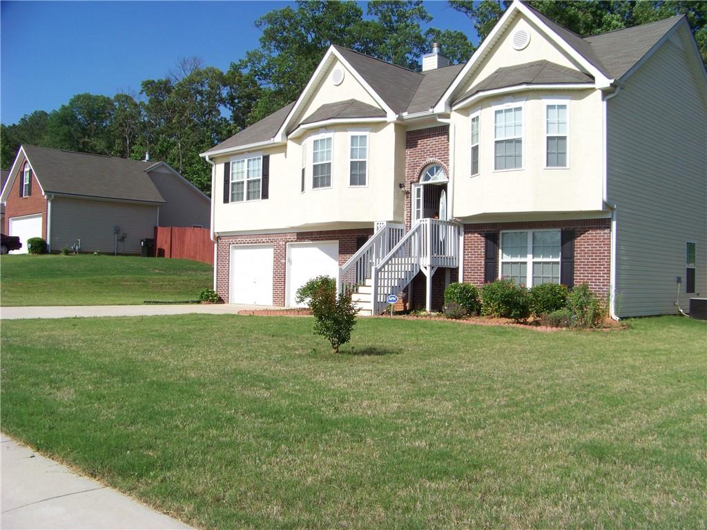 Welcome to this spacious 4-Bedrooms 3-Baths home in a quiet and convenient community. Master and two additional bedrooms on the main level. Fourth bedroom 1-bathroom and large family room on the lower level. Large private backyard