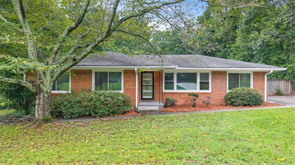 Nestled just outside the Perimeter in a prime Dunwoody location, 5124 Tilly Mill Road offers the perfect blend of modern convenience and suburban charm. Whether you're biking through the trails at Brook Run Park, exploring the weekend farmers market, or enjoying nearby restaurants and retail at Perimeter Mall, this home places you at the center of it all. Just minutes away, Brook Run Park features multi-use trails, a skate park, soccer and baseball fields, a dog park, outdoor theater, and even a community garden - making it one of the largest and most dynamic green spaces in the metro area. Step inside this fully renovated 4-bedroom, 2-bath brick ranch, thoughtfully updated for today’s lifestyle. Gleaming floors flow throughout the entire home, complemented by fresh paint and modern finishes. The kitchen is both stylish and functional, featuring stone countertops, stainless steel appliances, a breakfast bar, and white cabinetry, with direct access to a light-filled dining area - perfect for casual meals or entertaining. The spacious living room offers a separate, quiet space to relax or gather, while a fourth bedroom currently styled as a home office provides great flexibility for remote work or creative pursuits. Outside, enjoy the large deck, grill-ready gazebo, and garden beds overlooking a massive 0.7-acre fenced backyard - a rare find offering space to entertain, garden, or simply relax. A storage shed provides extra functionality for tools, gear, or hobbies. With stepless living, updated systems, and unbeatable proximity to parks, retail, and major highways, this home checks all the boxes for comfort, flexibility, and location.