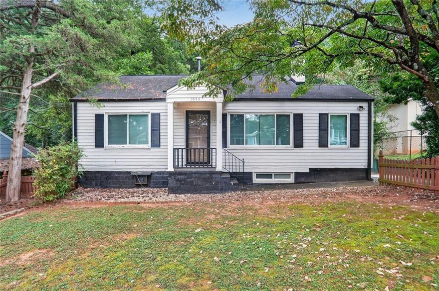 Exceptional Quadruplex opportunity in Atlanta's 30310. 1056 Regent Street SW is a rare quadraplex offering four private residences with flexible use for long-term tenants, short-term rentals, or an owner-occupant seeking income potential. Key updates include a 2018 roof, newer AC units, new windows, and two new water heaters, reducing maintenance costs and providing peace of mind. With separate utilities and spacious layouts, management is streamlined and attractive for investors. Ideally located minutes from downtown Atlanta, the BeltLine Westside Trail, Mercedes-Benz Stadium, and Lee + White, this property offers unmatched access to the city's growth and lifestyle amenities. Rarely available, quadraplexes of this quality present a unique chance to secure a cornerstone asset in a thriving market.