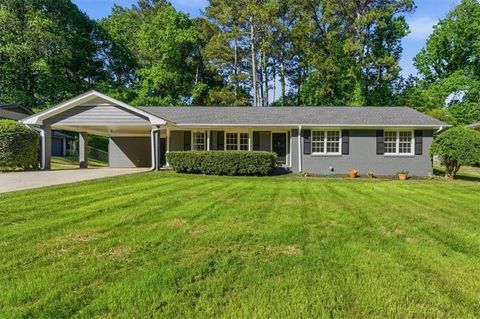 Photo of 395 Ben Avenue SW, Lilburn, GA 30047 (MLS # 7755258)