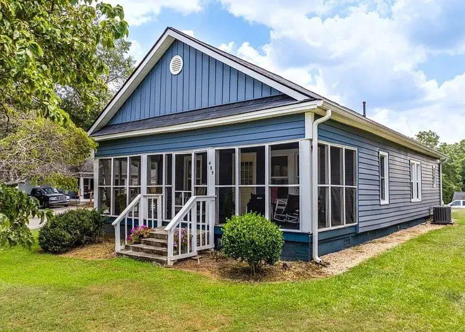Welcome to 489 Williams Street, a charming and character-filled ranch in the heart of Buford City. Built in 1930, this delightful home blends timeless appeal with modern updates. Featuring 2 bedrooms and 2 full baths, this property offers comfortable, one-level living on a spacious 0.34-acre lot.
Step inside to find a bright living area with classic details, an updated kitchen and bathrooms, and a separate dining room perfect for family meals or gatherings. The screened-in rocking-chair front porch provides the ideal spot for morning coffee or relaxing evenings, while the large, level yard offers plenty of space for play, gardening, or entertaining.
This home is conveniently located near Buford City Schools, Historic Downtown Buford, shopping, restaurants, the Mall of Georgia, and Lake Lanier. Enjoy the perfect mix of small-town charm and modern convenience in one of Gwinnett County’s most sought-after areas.
Don’t miss this beautiful home that combines history, comfort, and location in the heart of Buford!