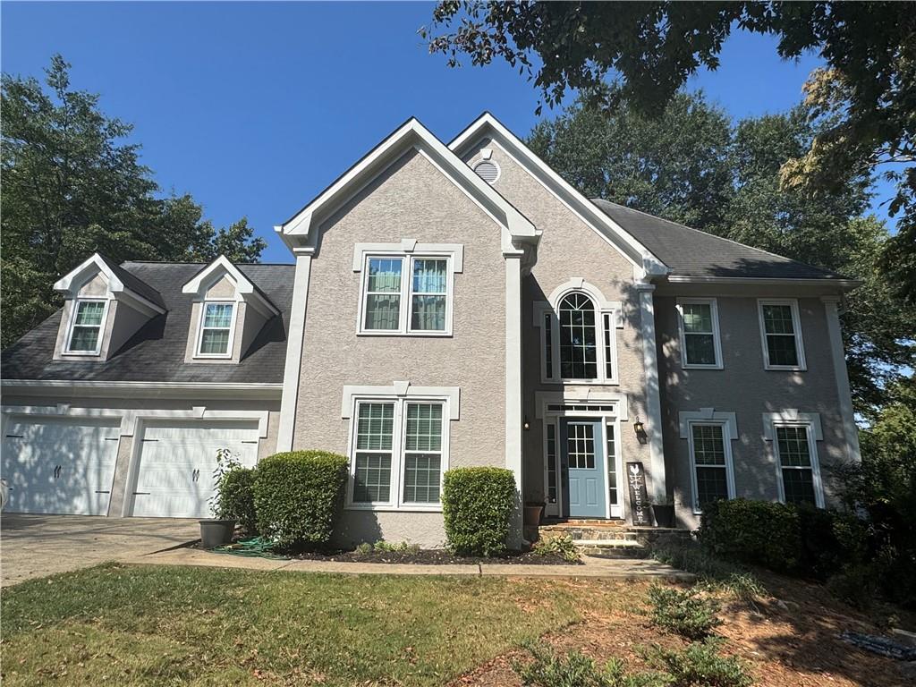 Beautiful East Cobb home in desirable Summerford! All top rated and award winning schools. Lovely and spacious open floorplan with lots of natural light streaming in on all sides. Gleaming hardwood floors on the main, fireplace with built-in bookshelves and cabinetry. Inviting 2-story foyer. New double pane windows throughout. Newly painted Hardcoat Stucco and Hardiplank siding. Huge deck just outside the family room overlooking the gorgeous private backyard. Luxurious kitchen open to the family room with granite and backsplash, solid oak cabinets and nice breakfast bar. Fabulous primary suite w/ lots of closet space, lovely bathroom with frameless glass shower, upgraded fixtures, and a jetted tub. All secondary bedrooms are extra spacious and have walk-in closets. Great setup with 3 full baths upstairs. Huge secondary bedroom with it's own bathroom makes for a comfortable and private 2nd master or guest room. Wonderfully finished and daylight basement with a full bathroom, multiple large living spaces, and tons of storage. Could easily be set up for an in-law suite. Check out the new large lower level deck and patio overlooking the private backyard with room for a pool. Quiet and level cul-de-sac lot in a wonderful & very active subdivision with pool, tennis, clubhouse and Gazebo.This is the ultimate location with a short jaunt to Shopping, Restaurants, Sandy Plains Baseball fields, Sweat Mountain Park and all its features of baseball, tennis, picnic shelter, play ground & awesome Dog Park. Cobb County's award winning schools, and a plethora of sporting activities, running & biking trails. EZ commute with I-75, GA 400 & I-285.