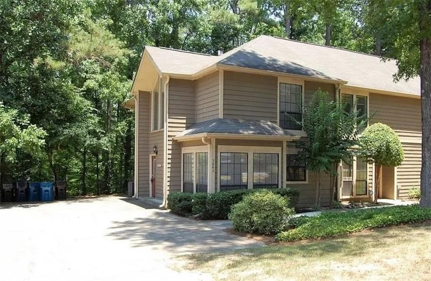 Located in the sought-after Alpharetta ES / Northwestern MS / Milton High School districts, this light-filled townhome blends modern design with peaceful surroundings. Enjoy upgraded designer tile bathrooms, an oversized garden shower in the primary suite, and a private balcony with serene wooded views. Fully renovated just two years ago, the home features a spacious family room and a back deck overlooking a quiet expanse of trees. Just minutes from the square, you'll have easy access to premier shopping, dining, and entertainment. Water and sewer are included in the rent.
