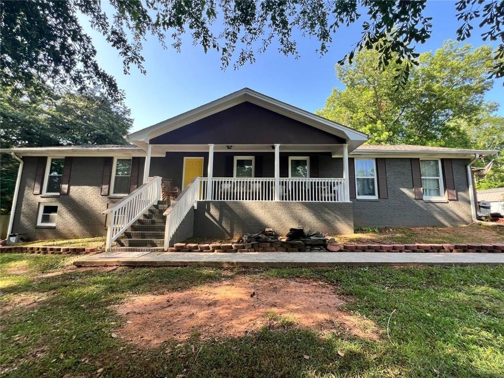 Imagine waking up each day on nearly two acres of peaceful land, where the charm of country living meets the convenience of nearby amenities. Tucked away just off Lake Jodeco Road, this all-brick ranch offers the space, freedom, and flexibility you’ve been searching for—without the restrictions of a subdivision. Whether you're dreaming of building out your garden, parking your RV, or finally building that custom workshop, this property makes it all possible.
Step inside and you’ll feel the warmth of hardwood floors stretching throughout the home. The kitchen features sleek stainless steel appliances. A spacious side porch, added in 2015, invites you to unwind with a ceiling fan overhead and views of your sprawling, fenced backyard. Both bathrooms were remodeled.
This thoughtfully designed home offers three bedrooms, two full bathrooms, and a unique office or homeschooling nook with custom floor-to-ceiling bookshelves—perfect for remote work, creative projects, or quiet study. Downstairs, the full basement is a blank canvas, with one finished 12x10 room and another partially complete space, giving you room to grow, entertain, or store all your tools and toys.
The roof was replaced in 2023, and the A/C unit was newly installed in 2024, providing peace of mind for years to come. Whether you’re looking to start a mini farm, enjoy private outdoor living, or simply want space to breathe, this home is a rare find in today’s market.
Don’t miss this opportunity to own a versatile property with endless potential.