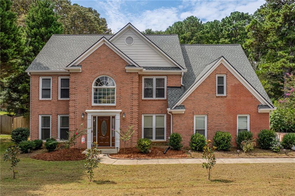 Welcome home to this charming well-maintained home in the heart of Grayson. The established community of Pebble Creek Farm offers convenience and stability with all the amenities! The large fenced lot and private patio are perfect for entertaining or relaxing. The inviting two story foyer welcomes you into the formal columned living room and adjoining dining room. The eat-in kitchen has granite counters and new appliances with plenty of cabinet space for storage and an open concept to adjoining family room. Upstairs the oversized primary suite has plenty of room for a relaxing sitting area as well as his and hers closets. The primary bath has double vanities, whirpool tub and separate shower. Walkable to the highly rated schools and a great community to live and prosper. Schedule your tour today!