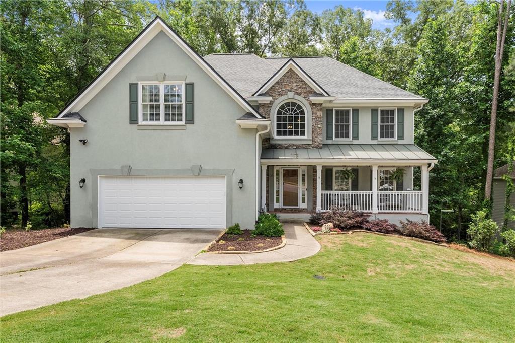 Get ready to fall in love with 2342 Tall Timbers Lane — a picture-perfect corner-lot gem tucked into one of Marietta’s most charming and well-kept neighborhoods, where the HOA fees are low and the community pride runs high. Located in a top-rated school district, this home offers the best of both worlds: peaceful surroundings with everyday conveniences just minutes away.
Start your mornings or wind down your evenings on the front porch, where the sunset views are simply unmatched — it's your personal front-row seat to Georgia's golden hour. Step inside and you'll immediately feel the flow of the open, sunlit floorplan. The main level is made for entertaining and easy living, featuring soothing paint color, a spacious dining room, a kitchen that opens right into the soaring, two-story living room, and a flexible bonus space perfect for a home office, library, or play area.
Upstairs, a cozy loft with built-in bookshelves offers a quiet corner for reading, working, or just hanging out. The primary suite is your private retreat, with a huge walk-in closet and a spacious bathroom complete with double vanities and a soaking tub that practically begs you to relax.
There's more- the fully finished lower level is a total game changer! Complete with its own kitchen, living area, and full bathroom, plus two extra bedrooms, it’s the ideal setup for guests, or multi-generational living. And with an abundance of storage space, you’ll have a place for everything.
Outside, multiple levels of brand-new decks overlook a partially fenced backyard — perfect for pets to play safely. Beyond the fence, explore your own wooded wonderland with a peaceful creek running along the rear. Whether you're hosting a cookout, sipping coffee in the morning sun, or taking an afternoon stroll through the trees, this outdoor space truly sets this home apart.
Come see it for yourself and discover why this home is the one you’ve been waiting for!