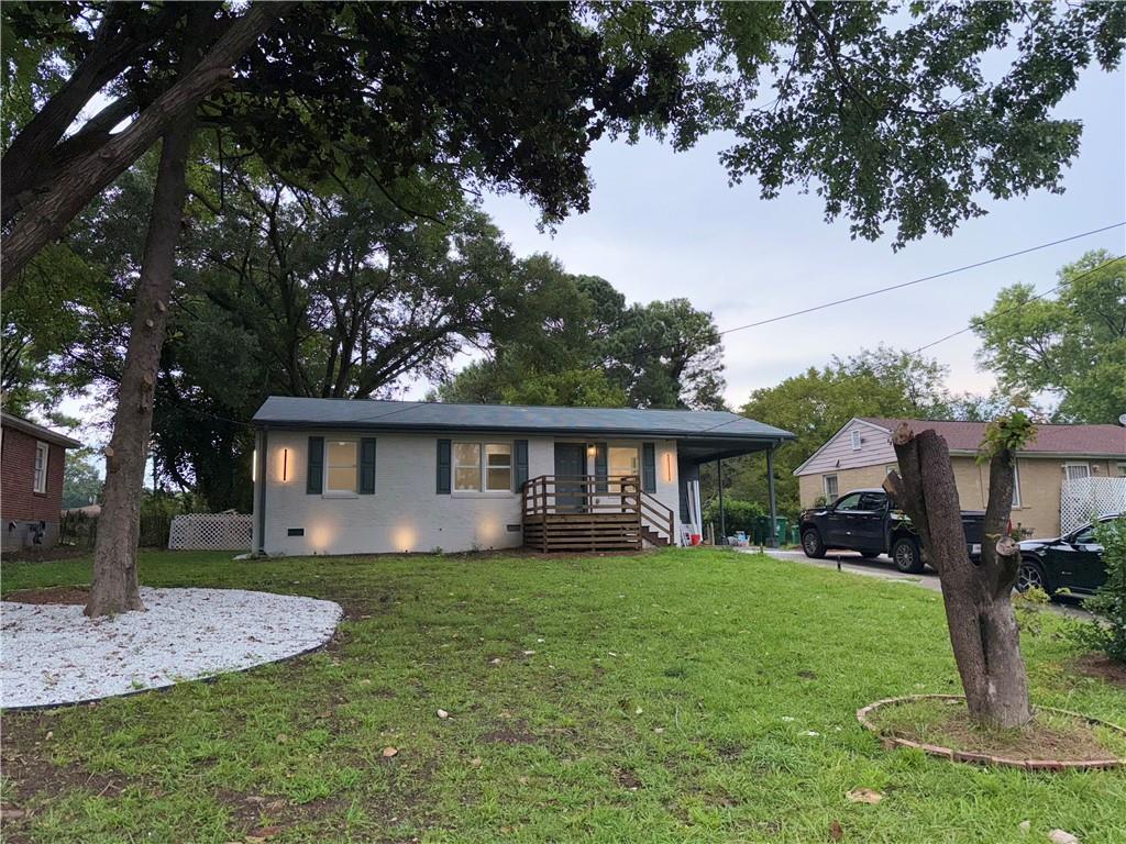 Beautifully renovated 3-bedroom, 2-bathroom home in a prime Decatur location with no HOA! This move-in-ready residence showcases thoughtful upgrades throughout, including new flooring, fresh interior and exterior paint, recessed lighting, and a fully modernized kitchen with custom cabinetry, quartz countertops, a waterfall island, designer lighting, and a complete suite of new appliances. Both bathrooms have been tastefully redesigned with contemporary tile walk-in showers, updated fixtures, and vanities with lighted mirrors. Additional highlights include newly built front and rear decks, a professionally landscaped and fenced backyard featuring a custom fire pit, and a resurfaced, lighted driveway. Major system improvements include all-new plumbing, updated electrical with a new panel, enhanced insulation, and all-new drywall. Ideally situated with convenient access to parks, schools, shopping, Shoal Creek Park, East Lake, downtown Decatur, and I-285. A beautifully updated home offering comfort, style, and location.