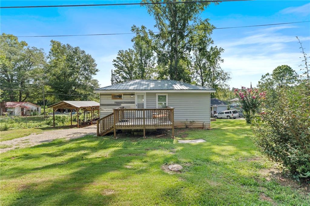 Looking for a quiet retreat on Lake Jackson? Look no further, come in and see this recently remodeled 3 bedroom 2.5 bathroom home. Gentle slope to the water allows for shore docking and fishing! Beautiful view from the oversized back porch, perfect for entertaining or relaxing in the evenings. With a little imagination the partially finished walkout basement featuring a full bath, can be completed into an ensuite, Man-cave? or She-shed! Covered storage to the left of the property will protect your boat from the weather. The oversized deck provides covered parking and or storage. This home has had many upgrades and is just waiting for your finishing touches! Do not wait, schedule a showing today!