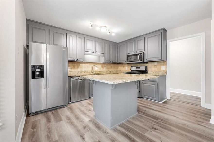 Welcome home to this beautifully renovated townhome located in the prestigious Johns Creek / Alpharetta area within the Riversong subdivision. This 3 bedroom 2 bathroom "end unit" home boasts an open floorplan with new upgrades including fresh paint (both interior and exterior), a new garage ceramic coated floor, new light fixtures throughout, remodeled kitchen and bathrooms, new window and door hardware, new doorbell, new carpet, landscaping, and so much more! This unit is situated on the end with a large front and backyard that is beautifully landscaped and allows a ton of natural sunlight. Additionally there is a large 2 car garage that is deep enough to fit a third car! The owner's suite has a renovated master bathroom with a huge double vanity and a tiled walk-in shower. There are oversized second and third bedrooms, a large living room, and fireplace. There is a craft/utility room on the main level that could easily be converted into a third bathroom / kitchen area. The owners have received a quote for this work and part of it may be negotiable in the offer. The quote has been loaded with the home documents. 
Rentals are allowed, so all investors are welcome! Sellers are motivated! Excellent location close to 400 and 141, with tons of nearby grocery stores, restaurants, shopping, schools, and more.