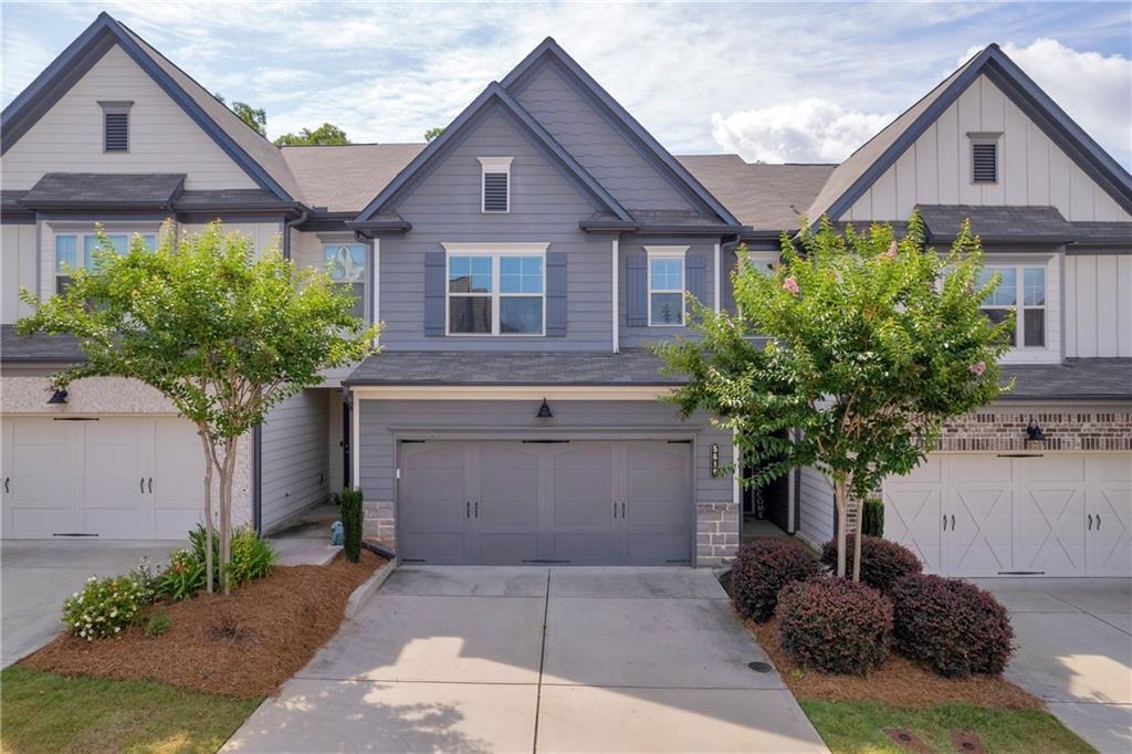 Welcome to 5615 Parkview Lane, a beautifully designed 3-bedroom, 2.5-bathroom townhome in the heart of Flowery Branch. With over 2,000 square feet of living space, this home combines modern convenience with thoughtful upgrades that make everyday living more comfortable.
The main level features an open-concept layout where the kitchen flows seamlessly into the dining and living areas, creating the perfect space for gatherings or quiet evenings at home. Upstairs, the primary suite offers a spacious retreat with its own private bathroom and ample closet space, while two additional bedrooms and a full bath provide plenty of room for family or guests. Also on the second floor is a large loft area, perfect for a home office, playroom, or media space. Each bedroom is equipped with a ceiling fan, offering year-round comfort and efficiency.
The attached garage not only provides secure parking but also comes with a brand-new 220-volt EV outlet, making it an ideal choice for electric vehicle owners. Additional features include central air and heat, a cozy fireplace, and low-maintenance living within a welcoming community setting.
Located in charming Flowery Branch, this home offers easy access to local parks, shopping, dining, and well-regarded schools. With its modern updates and convenient location, 5615 Parkview Lane is a perfect blend of comfort and functionality—ready to welcome its next tenant.