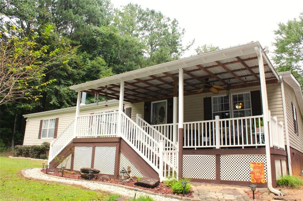 Welcome to this charming 3-bedroom, 2-bathroom home nestled on 4.75 private acres in Commerce. Set back from the road, this property offers both privacy and convenience, located just minutes from the main highway for an easy commute. The home sits on a pier/block/post foundation with crawl space, offering easy access and added stability. Inside, you’ll find comfortable living spaces with room to personalize, while outside provides plenty of space for recreation, gardening, or simply enjoying the quiet surroundings. With its combination of acreage, location, and potential, this property is ready to be your next home.
Lot dimensions are approximate; buyers encouraged to verify if exact measurements are needed