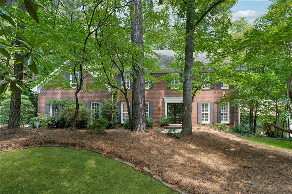 Welcome to 904 Willeo Place, a rare opportunity in River Forest! This well-maintained one-owner home is tucked away on a quiet cul-de-sac in East Cobb’s highly sought-after Timber Ridge Elementary, Dickerson Middle and Walton High School district. Enjoy the peace and privacy of a wooded backyard that backs to a creek, creating your own natural oasis right in the heart of Marietta. Gorgeous double front doors lead into a foyer flanked by formal living and dining rooms. A fireside family room is spacious yet cozy, and hardwood floors are throughout the main floor. The kitchen is perfect for gathering, cooking, and entertaining, featuring an island, breakfast bar, wall oven and microwave, electric cooktop, built-ins, pantry and breakfast room. You’ll love the vaulted screen porch and deck for sipping your coffee and listening to the sounds of nature. Upstairs is the primary suite with walk-in closet, dual vanities, soaking tub and tiled shower. Three bedrooms share a hall bath. A second master suite was created from the bonus room and includes a TV/sitting room and a full bath. The finished basement offers flexible living space for a media/rec room or gym, plus a dedicated workshop and extra storage for all your projects and hobbies. Located in the welcoming River Forest swim/tennis community, this home is just minutes from Canton Street in Roswell, the Avenues of East Cobb, and all the top-rated schools and amenities East Cobb has to offer. Don’t miss it!